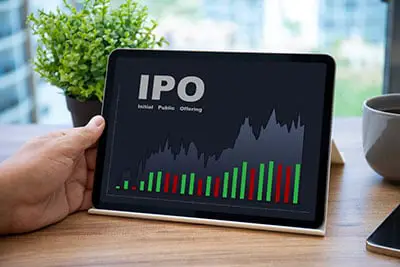 Female hands hold a phone with IPO stocks purchase app