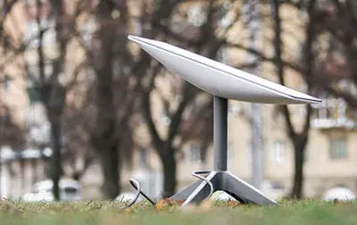 A Starlink dish antenna on a park