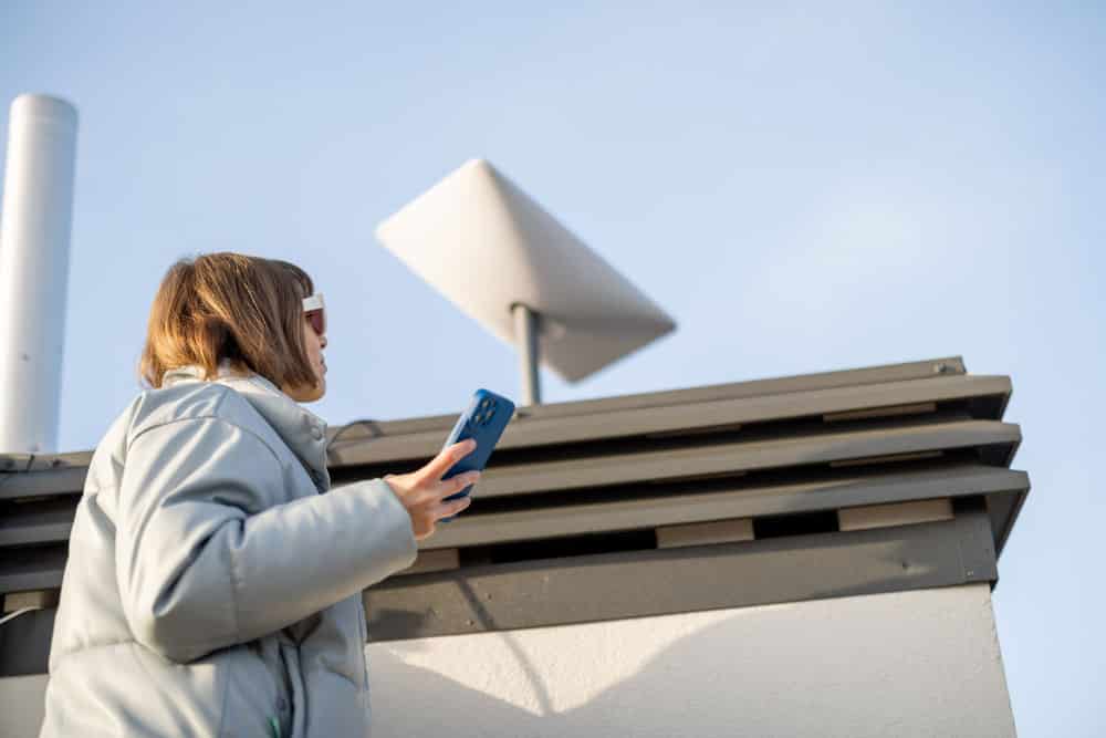 A woman holding a phone