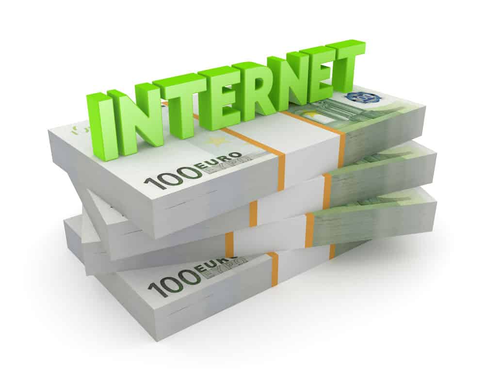 The word internet on a stack of cash
