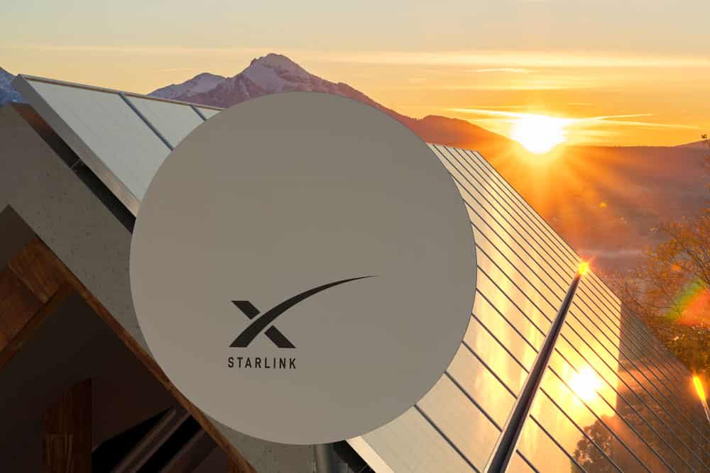 A Starlink round dish on the roof with solar panels