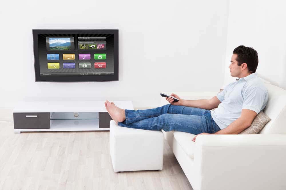 Adjusting TV settings.