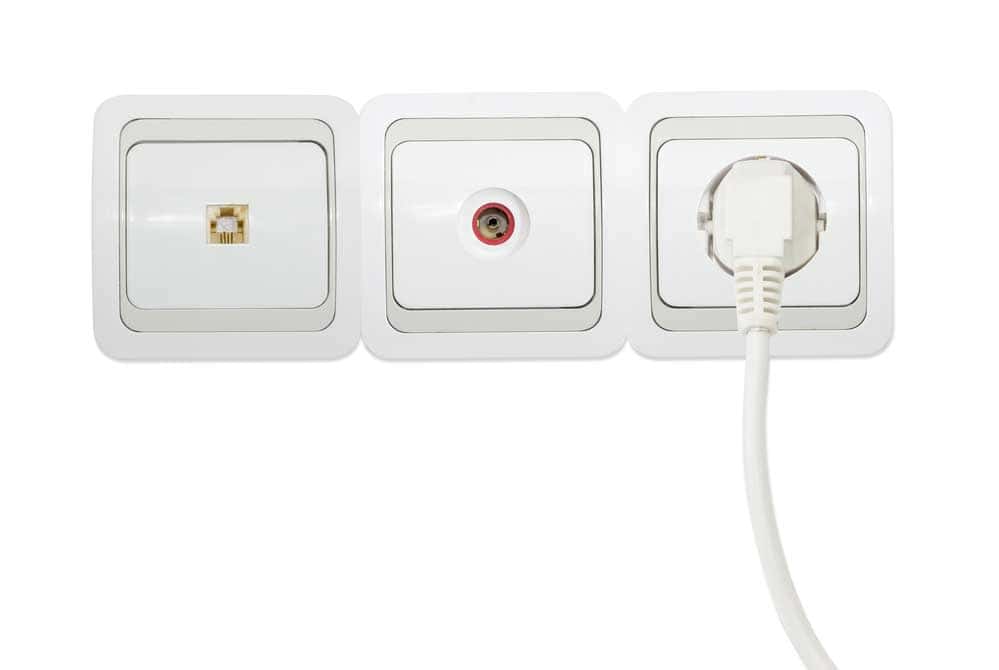 TV socket plugs on the wall.