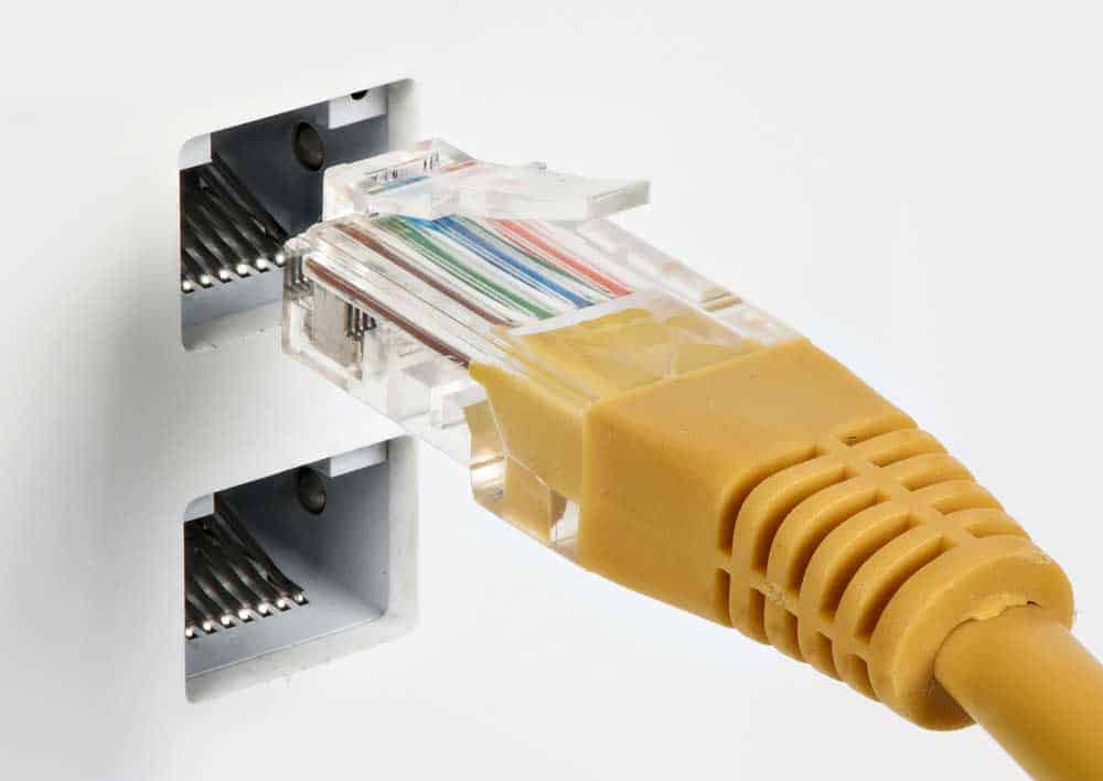 Network cables are connected to a switch.