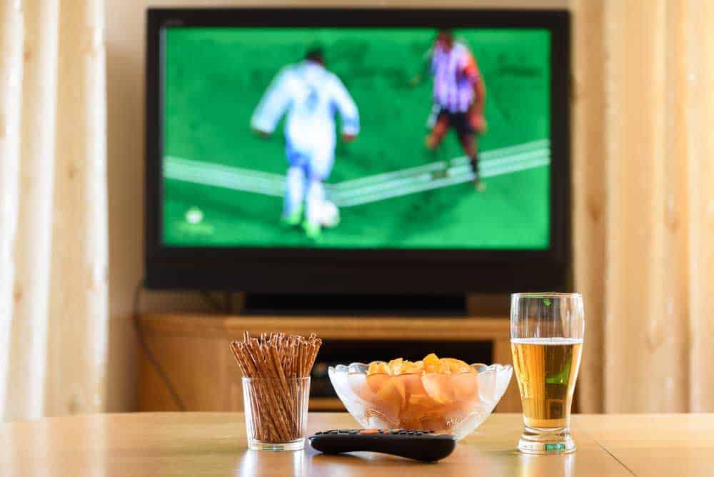 A Vizio TV is showing a soccer match.